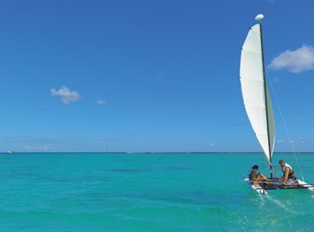 Many water sports at Trou aux Biches include sailing